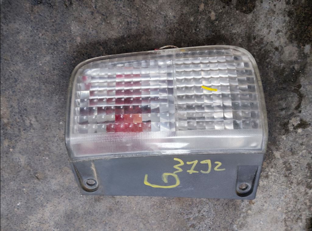 piece_RENAULT TRAFFIC 1.9 DCI - 8V TURBO FEU DE RECUL GAUCHE 7701479309